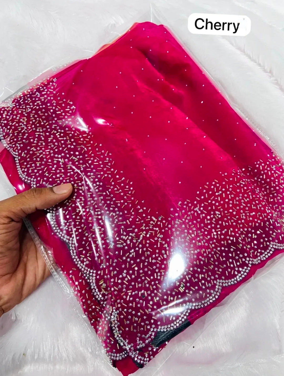 Premium Fandy Satin saree pure hand diamond work.