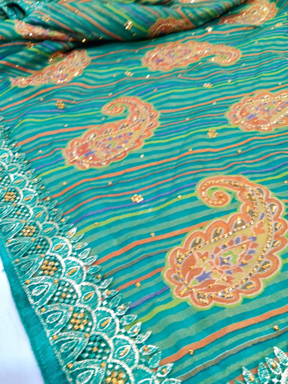 pure Gorgeet Hand brasso print fancy saree with blouse