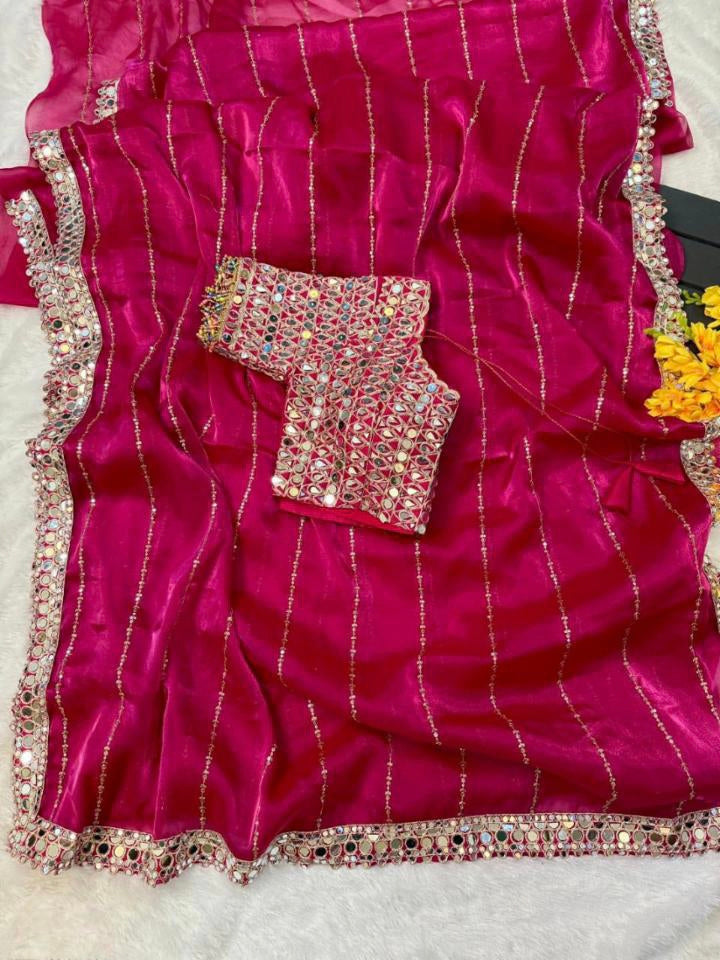 New mirror work saree features Soft  jimmy choo Organza saree which is embedded with real mirror work Embroidery all over the borders