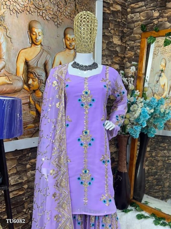 ĐĚSIGNER PARTY WEAR TOP AND SARARA. WITH FANCY DUPPATA WITH HAVY EMBROIDERY WORK