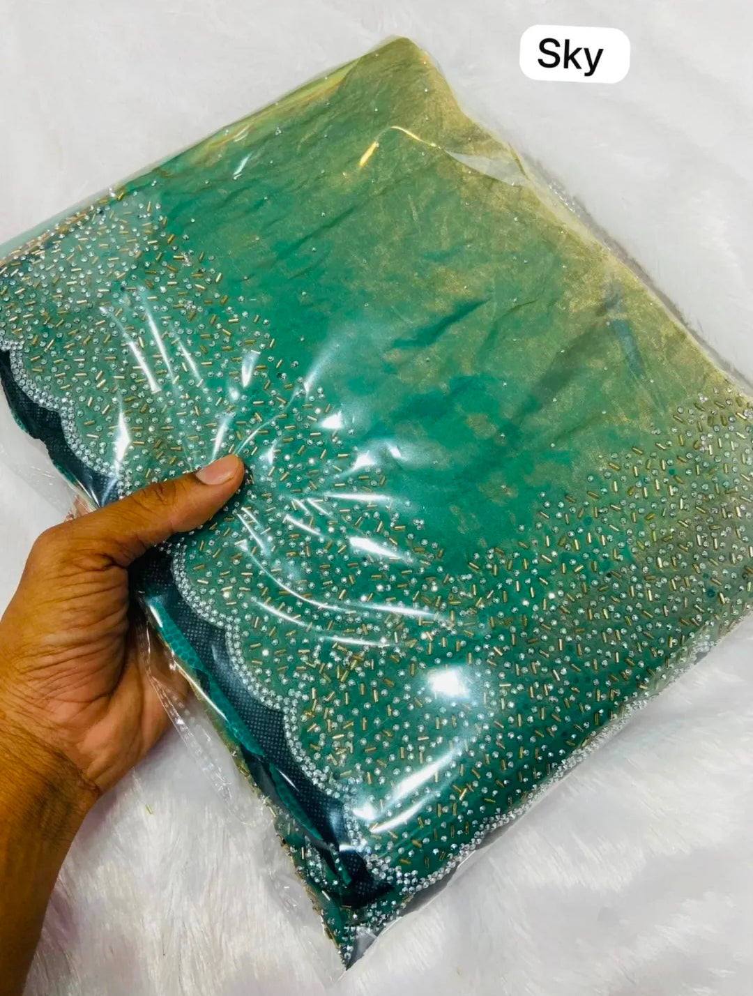 Premium Fandy Satin saree pure hand diamond work.