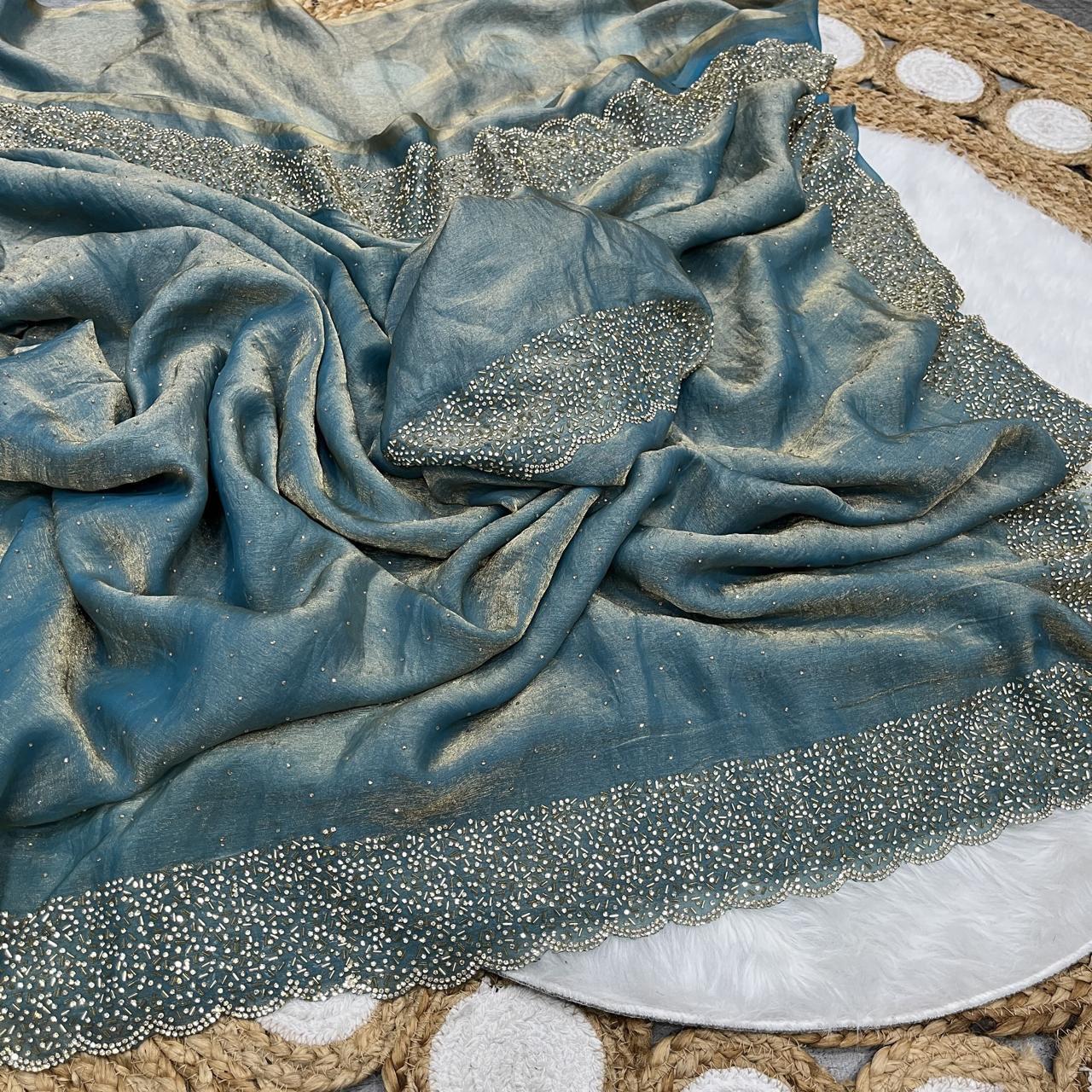 Premium Fandy Satin saree pure hand diamond work.