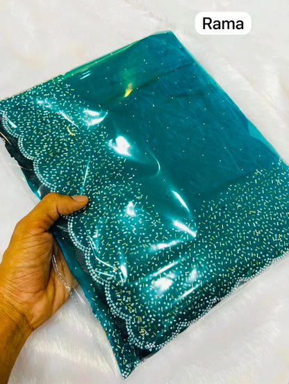 Premium Fandy Satin saree pure hand diamond work.