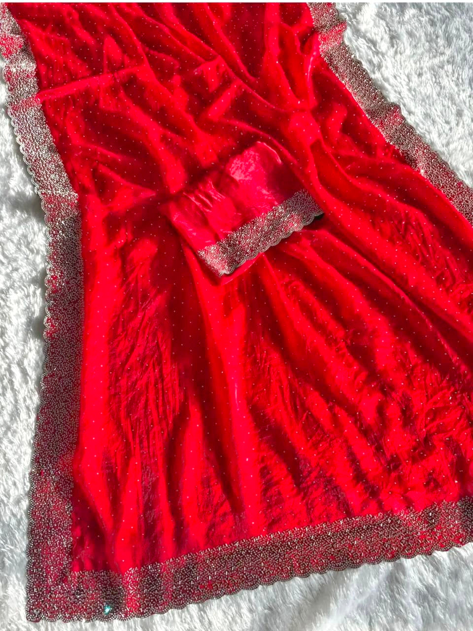 Premium Fandy Satin saree pure hand diamond work.