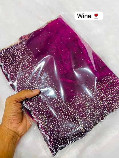 Premium Fandy Satin saree pure hand diamond work.