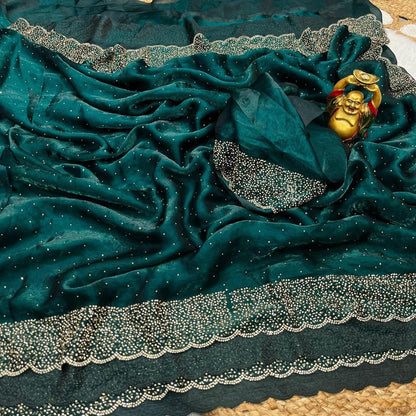 Premium Fandy Satin saree pure hand diamond work.