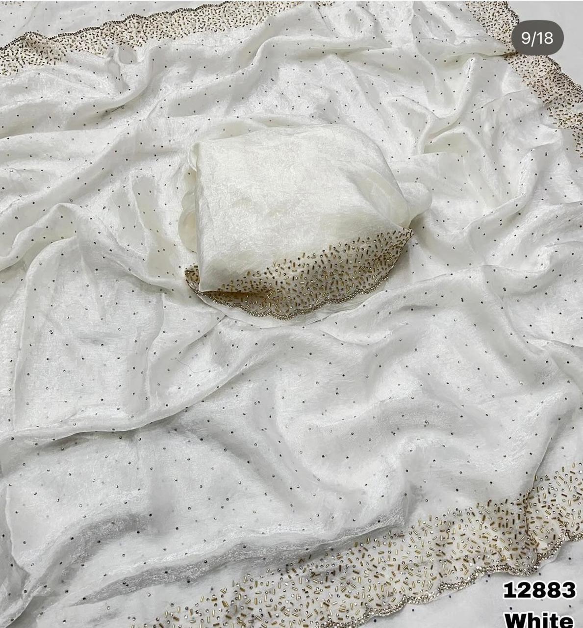Premium Fandy Satin saree pure hand diamond work.