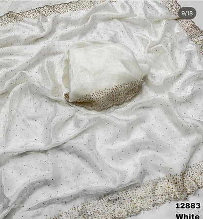 Premium Fandy Satin saree pure hand diamond work.
