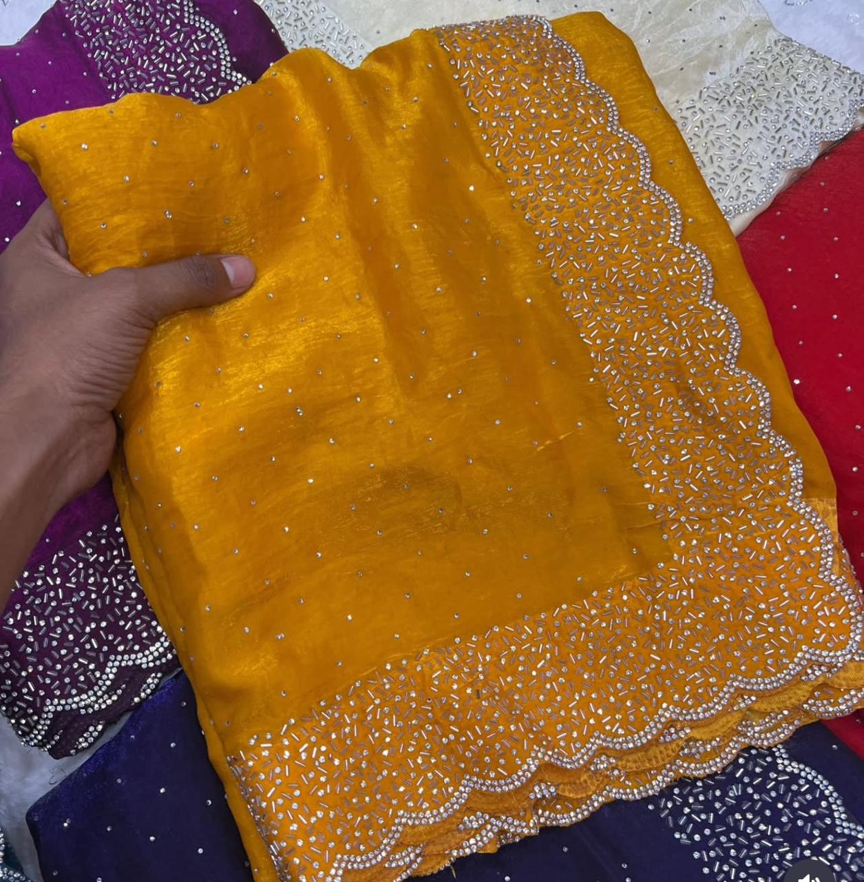 Premium Fandy Satin saree pure hand diamond work.