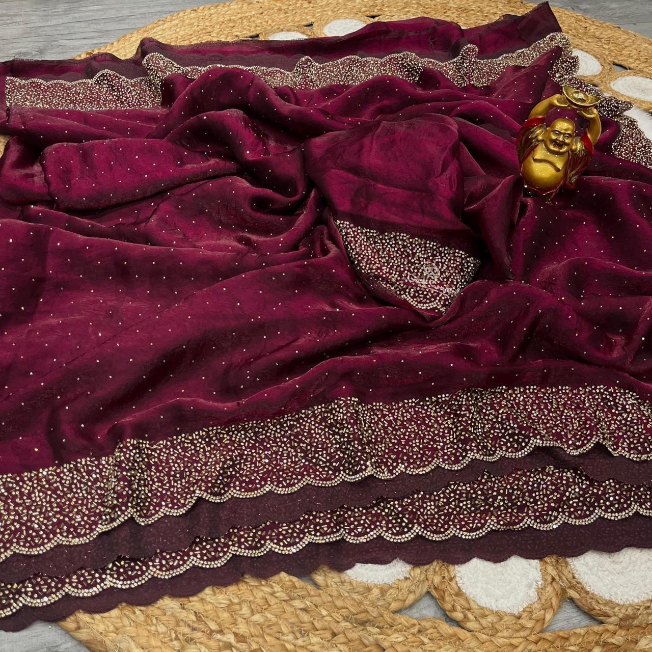 Premium Fandy Satin saree pure hand diamond work.