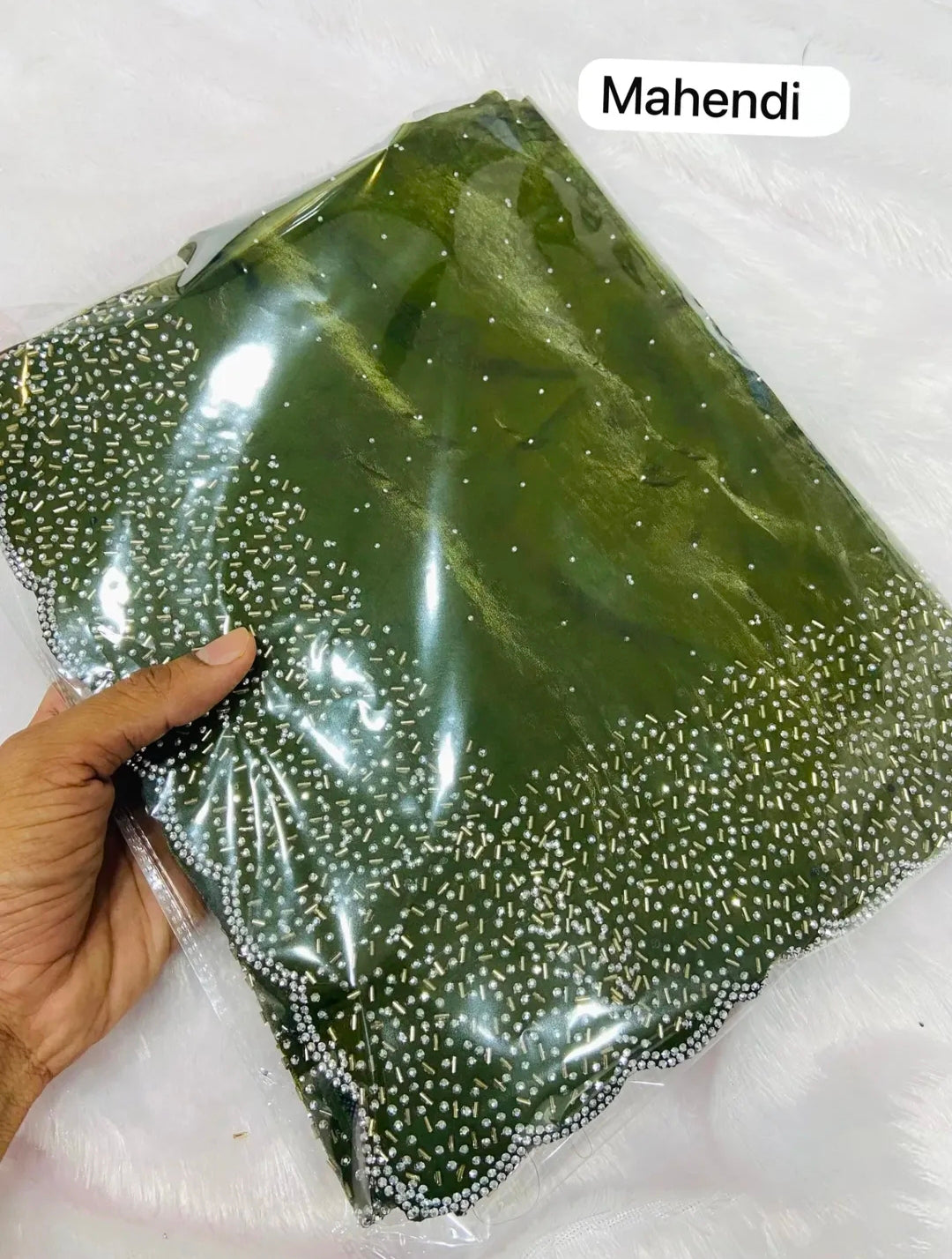 Premium Fandy Satin saree pure hand diamond work.